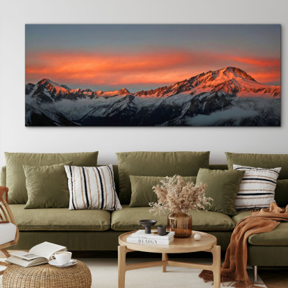 Quadro Montagne Catena Montuosa Innevata Al Tramonto Con Nuvole Arancioni Luminose mow28 quadro stampato su tela